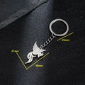 Close-up of a polished phoenix pendant keychain with hollow-out wings and metal ring - Hollow Phoenix (023)