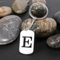 Polished stainless steel keychain featuring a rectangular pendant with letter E cutout - Letter E