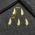 Five pieces of golden feather pendants in stainless steel with 20mm by 5mm dimensions - Feather Style (622) / 5 Pieces / Gold