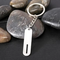 Polished stainless steel rectangular alphabet keychain with mirror finish on stones - Letter I