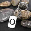 Silver stainless steel keychain with hollow letter O charm on natural pebble stones - Letter O