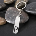 Polished stainless steel keychain featuring a rectangular pendant with letter P cutout - Letter P