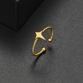Macro shot of gold twist rope ring with north star and small beads detail - Four-pointed Star Style (321) / Gold