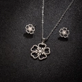 Conjunto de joyas de acero inoxidable con flor calada, collar colgante y pendientes a juego - Color Acero