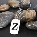 Polished stainless steel keychain featuring a black engraved letter Z with silver ring - Letter Z
