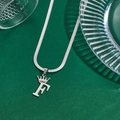 Silver stainless steel snake chain necklace with crown letter F pendant on green background - Letter F