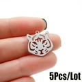 Tiger head stainless steel hollow pendant in silver finish held between fingers - Tiger Head Style (564) / 5 Pieces / Steel
