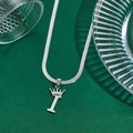Silver crown letter T pendant necklace with flat snake chain on green background - Letter I