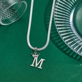 Silver stainless steel snake chain necklace featuring a crown-topped letter M pendant - Letter M