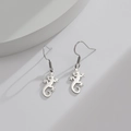 Pendientes de lagarto minimalistas en acero inoxidable calado con un acabado de plata fina - Color Acero