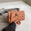 Handcrafted woven crossbody bag in coral orange leather with adjustable shoulder strap - Coral Pink