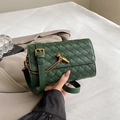 Deep green woven leather crossbody bag with golden buckle and intricate handcraft - Green