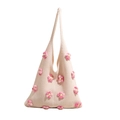 Chic cream knitted shoulder bag featuring handmade pink 3D crochet floral embellishments - Pink