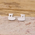 Minimalist stainless steel boot stud earrings with star cutout on a natural stone base - Silver