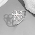 Detail of silver cherry blossom ring with matte brushed texture and open adjustable band - Flower Steel