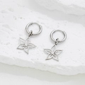 Pendientes bohemios de acero inoxidable plateado con dijes de flores y estrellas huecas - Color Acero