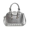Detail of silver shell bag featuring metal chain with dice charms and studded bottom - Silver