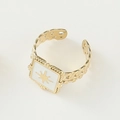Detail of vintage 14K gold open ring with square white enamel and sunburst star motif - Adjustable Open / Square White