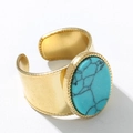 Anello regolabile in acciaio al titanio dorato con turchese ovale e bordi decorati - Stile Largo Aperto Turchese (A2638) / Blu Lago Largo