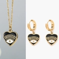 Detail of gold heart pendant with black evil eye enamel on stainless steel necklace - Black