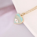 Collana a cuore dorata con smalto azzurro e occhio di Allah su base in pietra - Blu lago