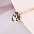 Collana a cuore in acciaio placcato oro 14k con ciondolo evil eye in smalto - Nero
