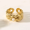 Vintage gold twist chain ring with white stone inlay and minimalist luxury style - White