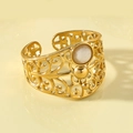 Golden open ring with vintage filigree design and white stone inlay for women - White