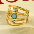 Gold multi-layer stacking ring featuring turquoise and clear zircon gemstone accents - Light Green
