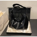 Detail of black pebbled faux leather shoulder bag with decorative zippers in gift box - Black