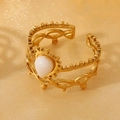 Detail of 18k gold plated stainless steel layered ring with white teardrop gemstone - White