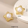 Vintage gold star earrings with large pearl inlay and textured hammer finish details - Starfish Inlaid Pearl Earrings
