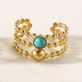 Detailansicht eines böhmischen Goldrings mit Türkisstein und goldener Perle in Schichten - Gold mit blauem Türkis