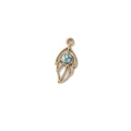 Detailed view of bohemian gold leaf pendant with a turquoise bead and hanging loop - Leaf