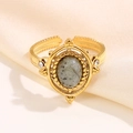 Vintage golden ring featuring an oval grey natural stone and intricate twisted metal textures - Gold-Grey Stone (A4629)