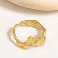Irregular liquid gold hollow ring with adjustable open design and glossy molten texture - Fluid Wave Design