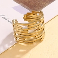 Moderner unregelmäßiger Lagengold-Edelstahlring mit offenem flüssigem Metalldesign - Gold