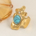 Anello lava dorato irregolare con pietra turchese naturale e dettaglio in zircone - Turchese (A4740)