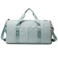 Mint green high-capacity travel bag with adjustable strap and dual front pockets - Green