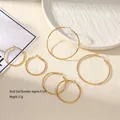 Créoles rondes minimalistes en acier titane plaqué or 18k en trois tailles différentes - Petit / Doré