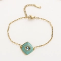 Gold stainless steel bracelet featuring a light blue enamel evil eye square pendant - Blue