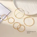 Boucles d'oreilles créoles minimalistes en acier doré 18K avec grand diamètre de 6,5 cm - Grand / Doré