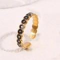 Anello in titanio dorato regolabile con punti in smalto nero e motivo circolare minimalista - Nero