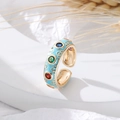 Adjustable gold ring with sky blue enamel and colorful zircon stones on artistic stand - Blue