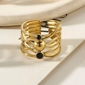 Gold plated intertwined ring with navy blue beads and a central gold ball detail - Dark Blue