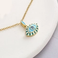 Exaggerated evil eye pendant necklace with light blue crystal and green enamel finish - Blue & Blue