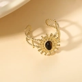 Goldener Sonnenblumen-Ring mit ovalem braunem Edelstein und Retro-Sonnenstrahl-Textur - Braun