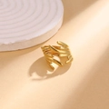 Adjustable golden stainless steel wing ring with a minimalist fluid feather design - Feather Wing Style / Gold