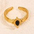 Adjustable gold-plated titanium ring with black oval stone and spiral twisted band - Black Style (A4774)
