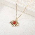 Boheemse goudkleurige rvs ketting met roodstenen oog-hanger en kristallen diamanten - Robijnrood